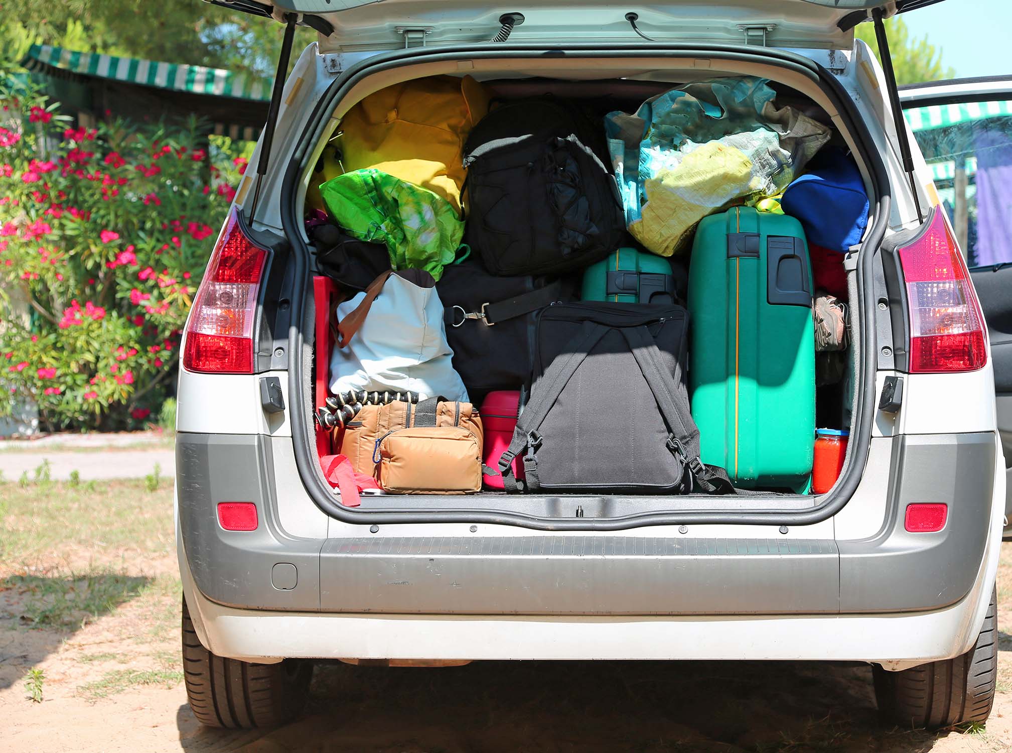 luggage and suitcases in car for departure