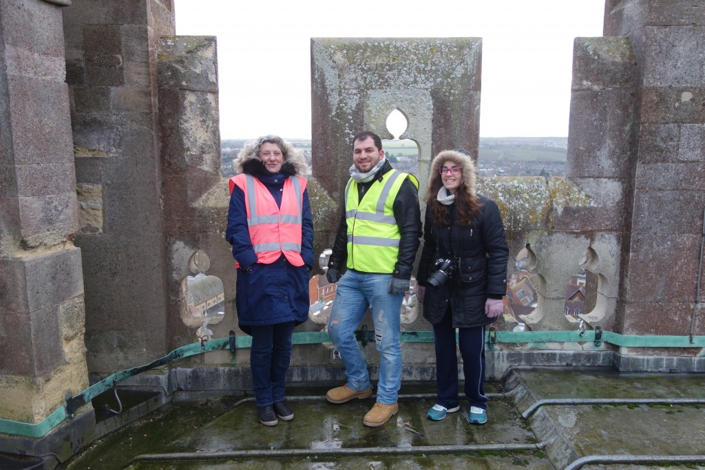Heather Newton, Head of Stone Conservation of Canterbury Cathedral (left) and students of the MSc programme in Architectural conservation on the top of "Bell Harry", the central tower of Canterbury Cathedral.