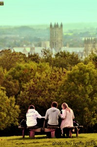 students on campus with view of Canterbury Cathedral