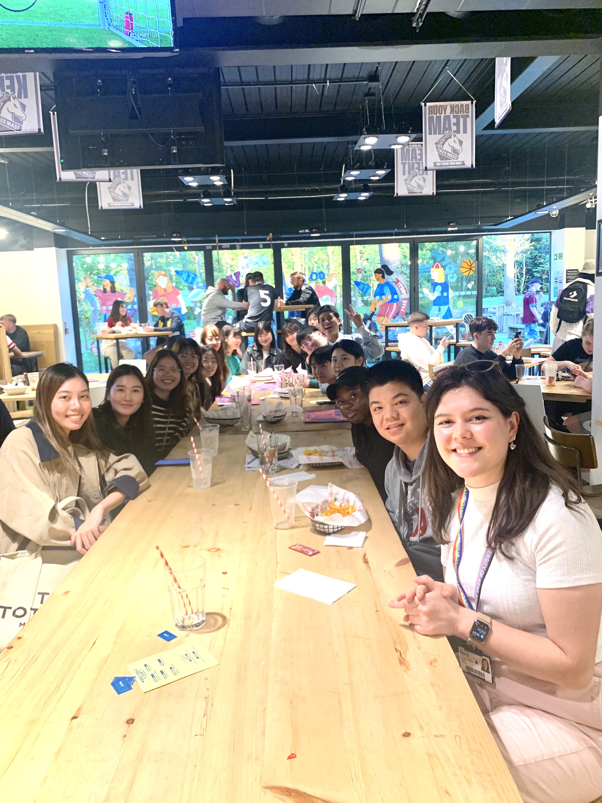 Pre-sessional students enjoy a meal in Woody's