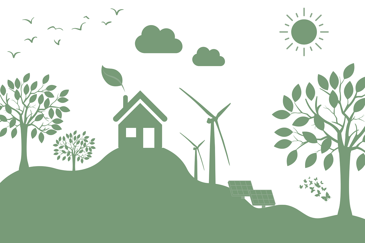 A silhouette of a house on a hill with wind turbines