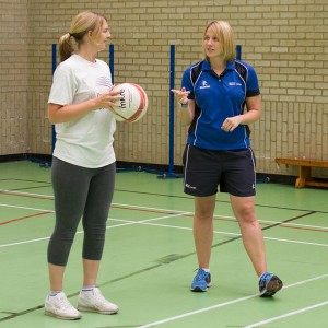 Louisa Arnold coaching netball during staff lunch breaks