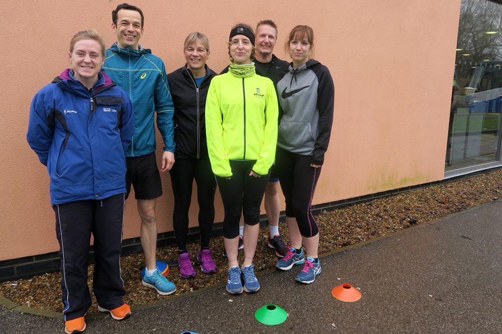 Sports Development Officer Sarah Kerly with run leader Barry Hopkins and some of the running club participants.