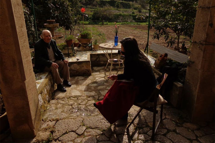 María interviewing a farmer in Serra de Tramuntana