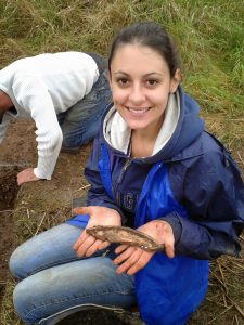 University of Kent student Eleonora with a painted pottery dish fragment recovered at the Roman Farm at Hatcliffe, Lincolnshre
