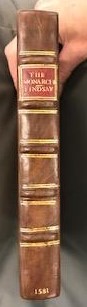 Quarter leather binding, impressed with gold.