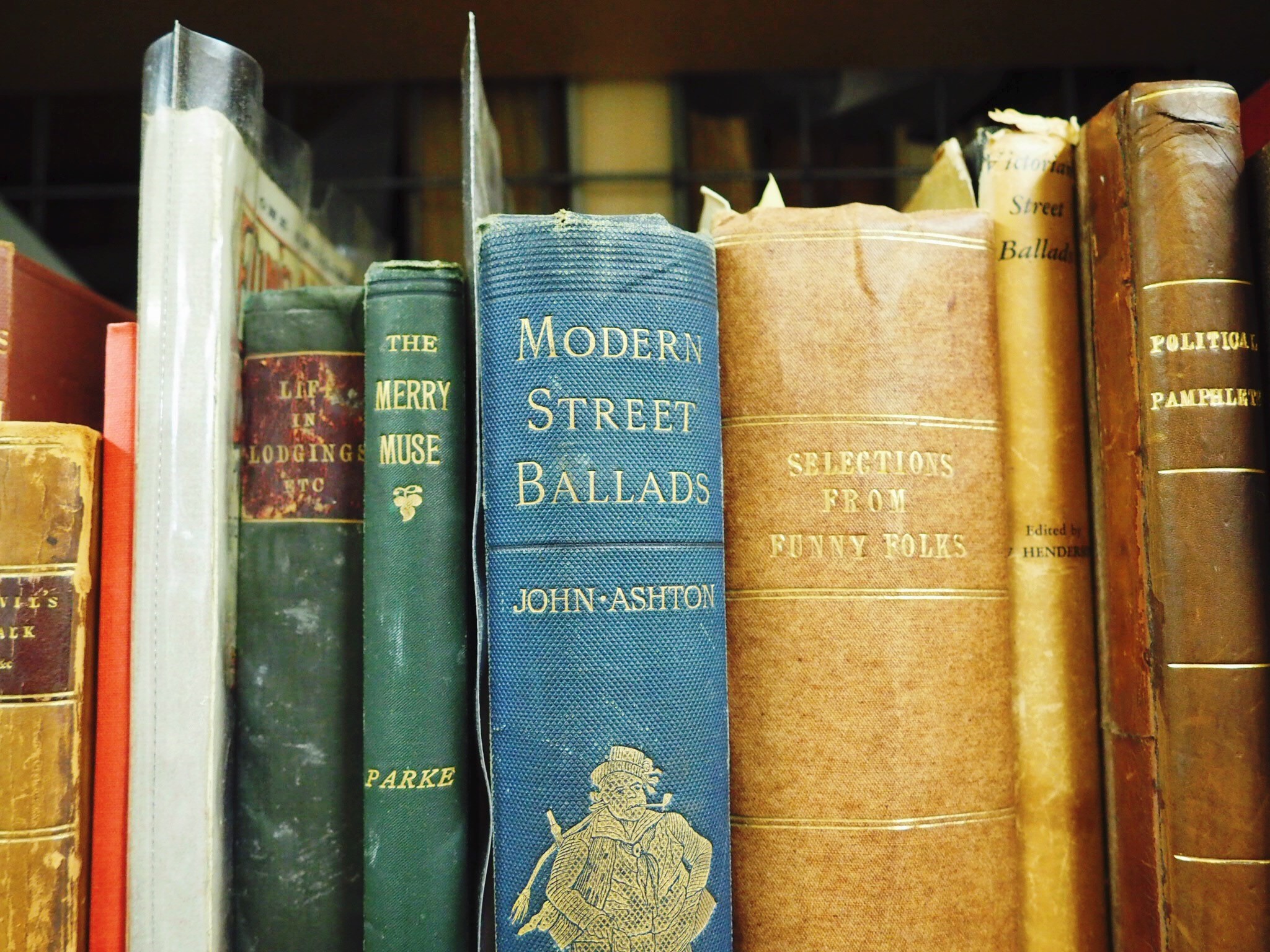 A colourful row of books from the John Crow Ballad and Song collection.