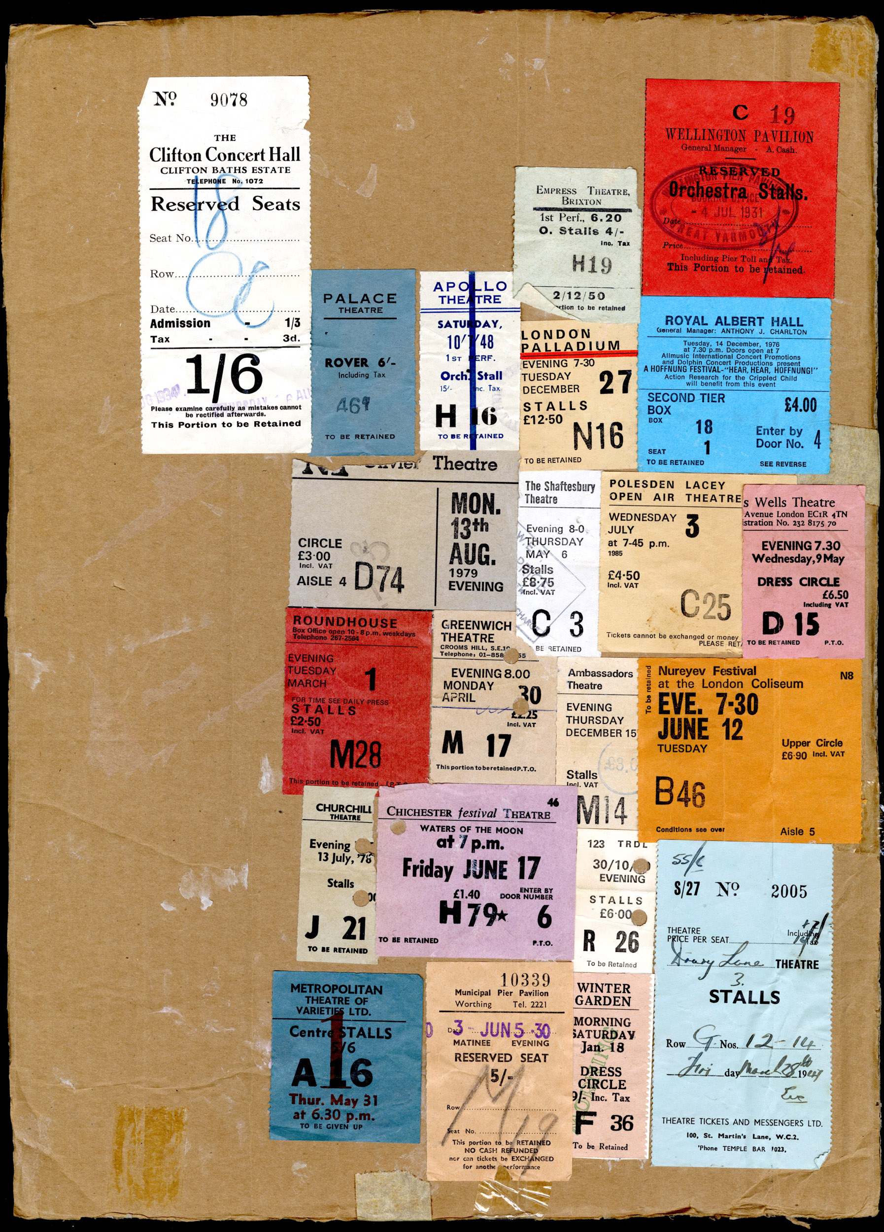 Selection of tickets from music hall events pasted on to a brown backing board from the Max Tyler Music Hall Collection