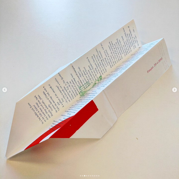 Image of Ryanairpithiplanium, single sheet poem folded into a paper aeroplane.