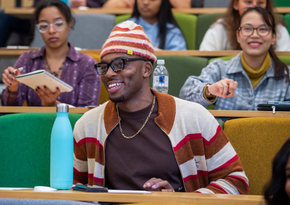 Students smiling in audience for Business Start Up Journey