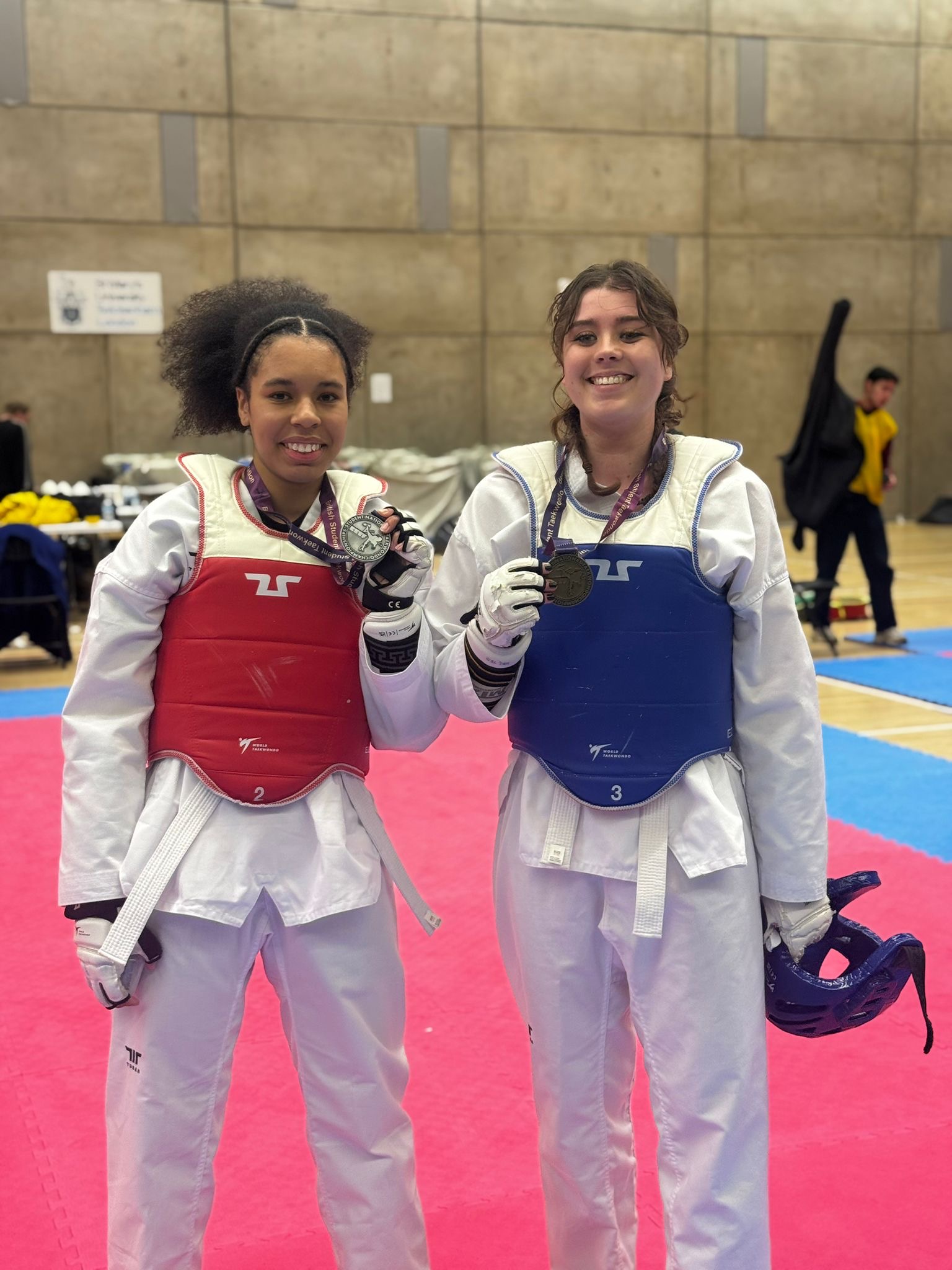 Students smiling with their medals