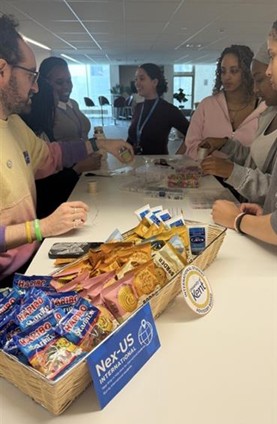 Students chatting and making bracelets