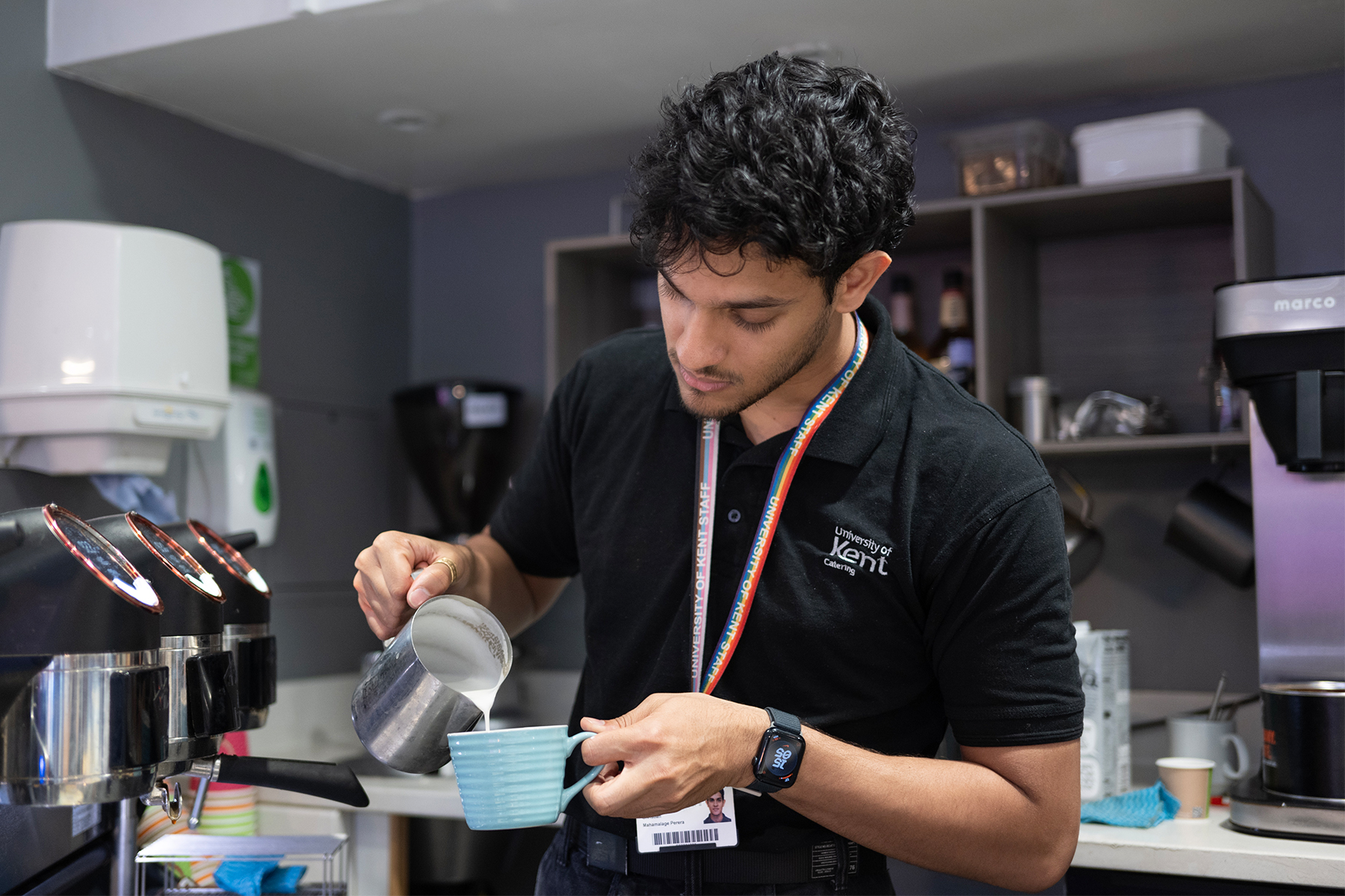 Gulbenkian Café Senior Supervisor, Christian Mahamalage Perera, makes a coffee using the new Ambition blend