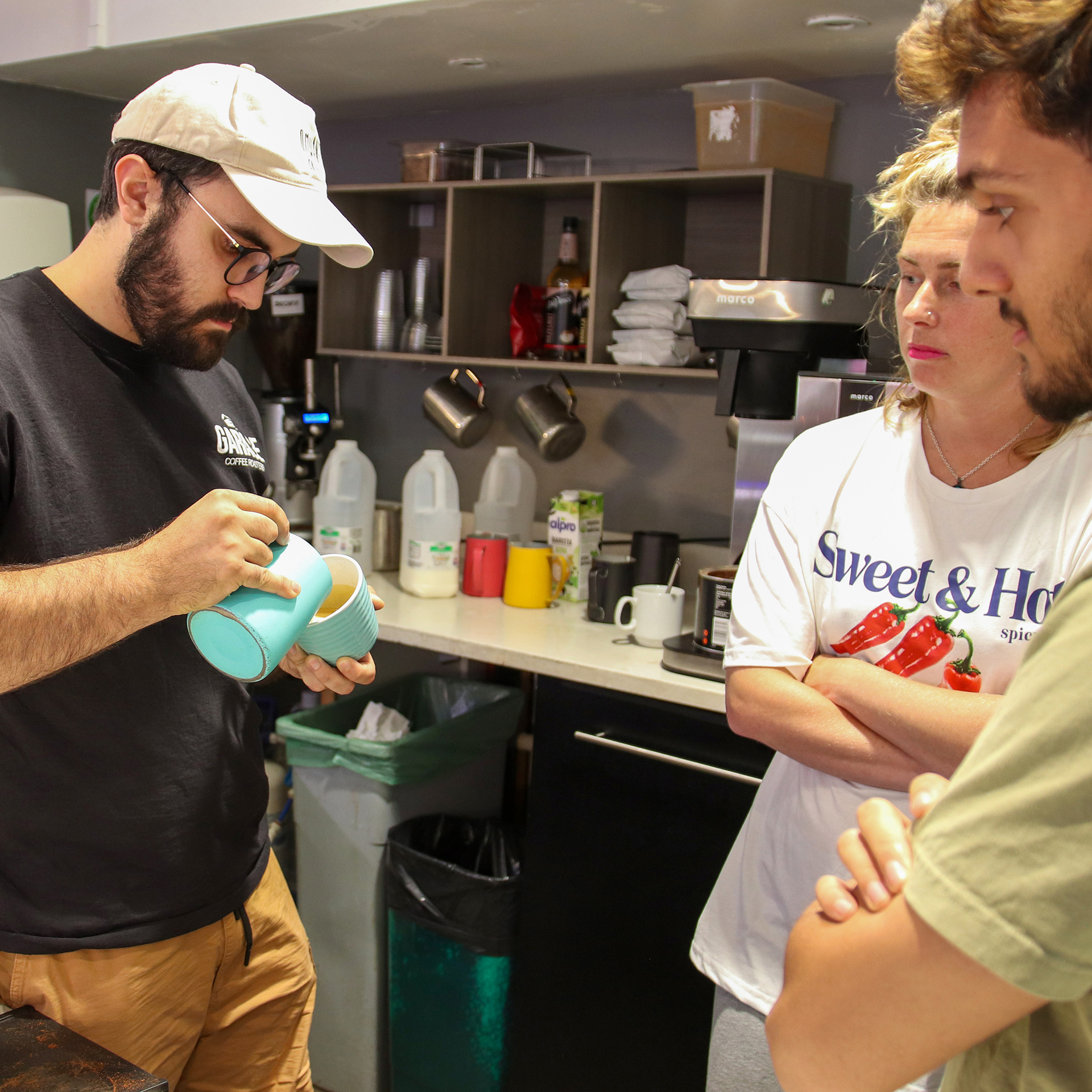 Garage Coffee show staff how to make the perfect latte