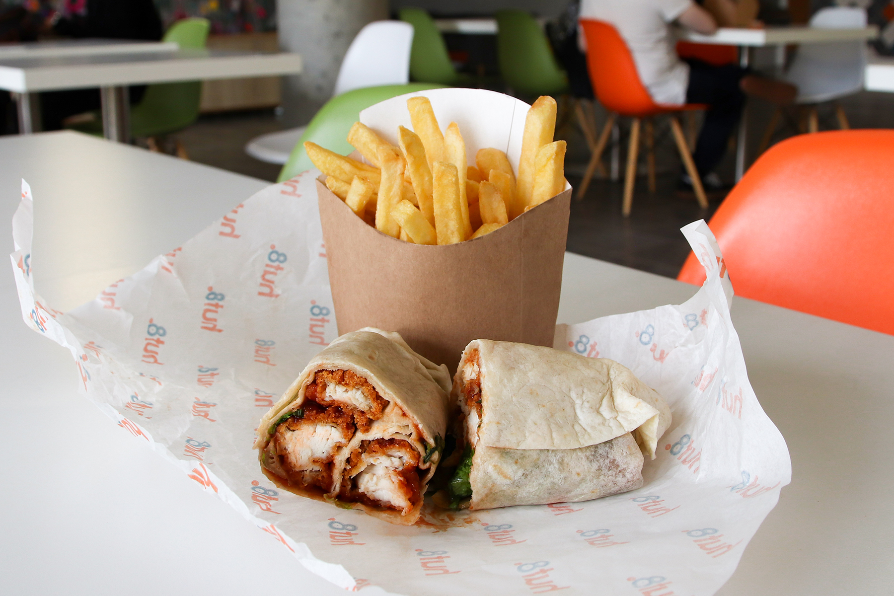 A crispy chicken wrap meal from Hut 8