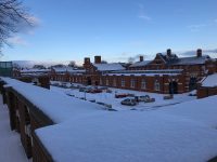 The Drill Hall Library and car park in the snow