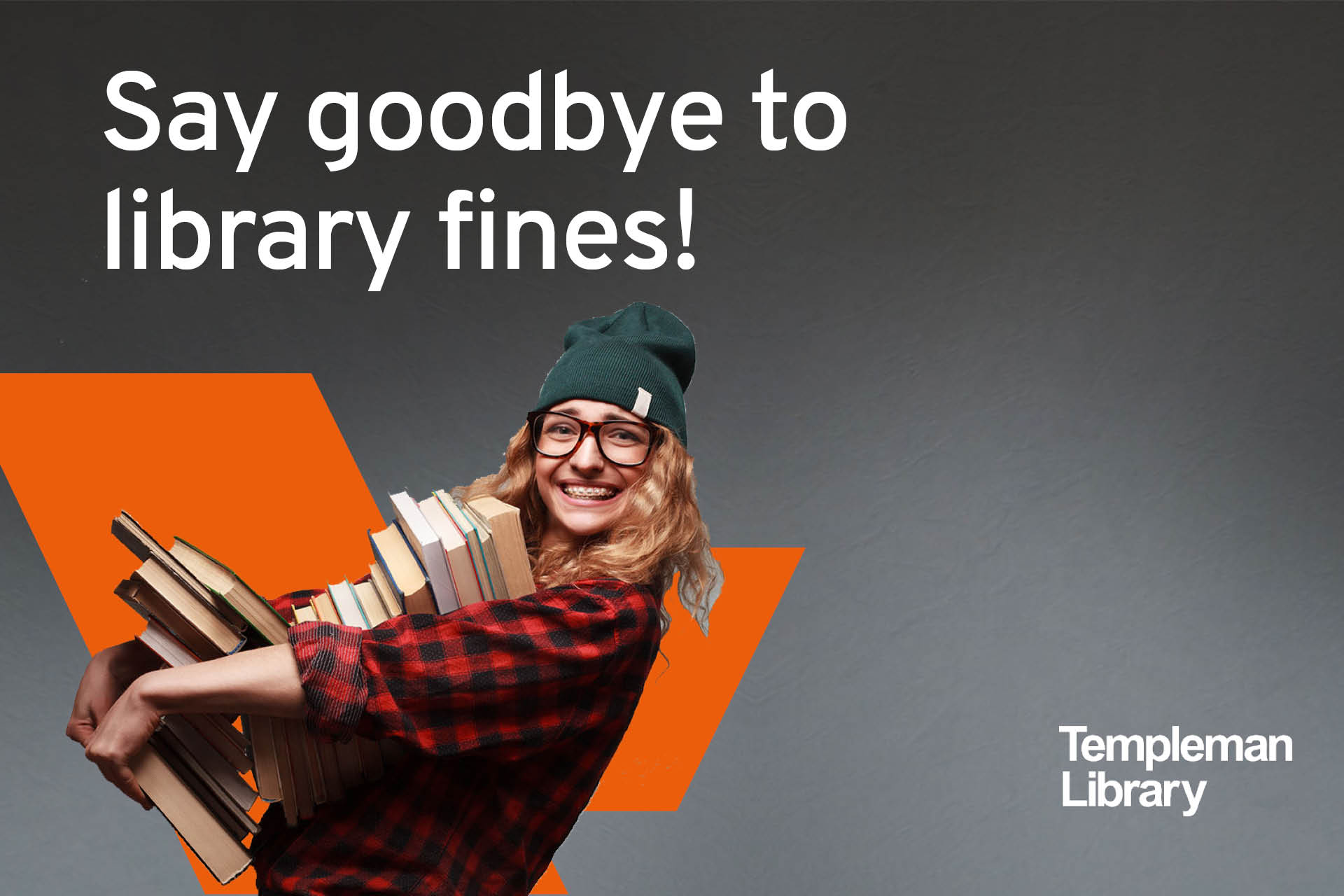 Say goodbye to library fines! Student holding pile of books