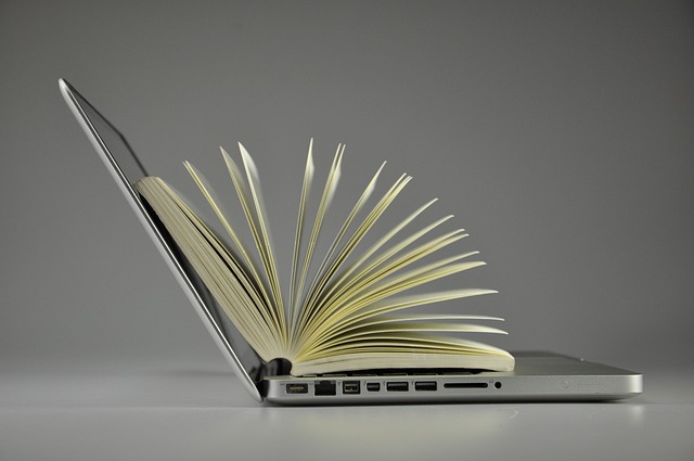 open book on laptop