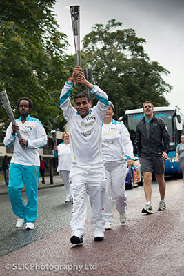 Kush Kanodia carrying the Paralympic torch