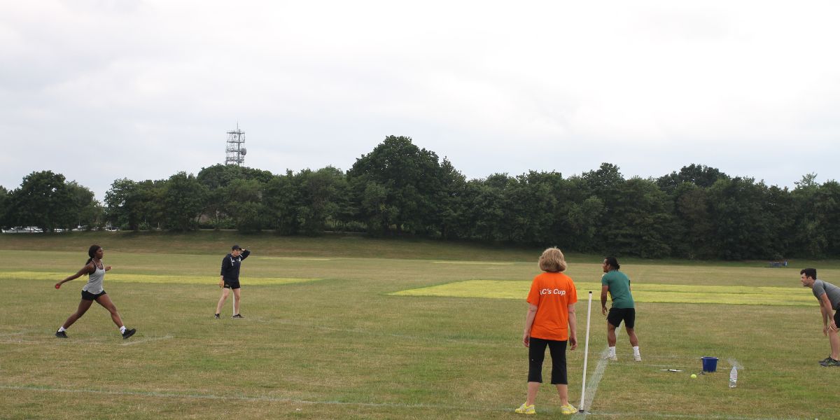 Player bowling the ball in a game of rounders