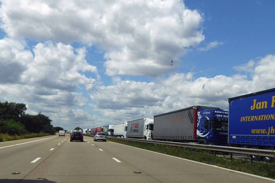 Lorries queued on M20 in operation stack