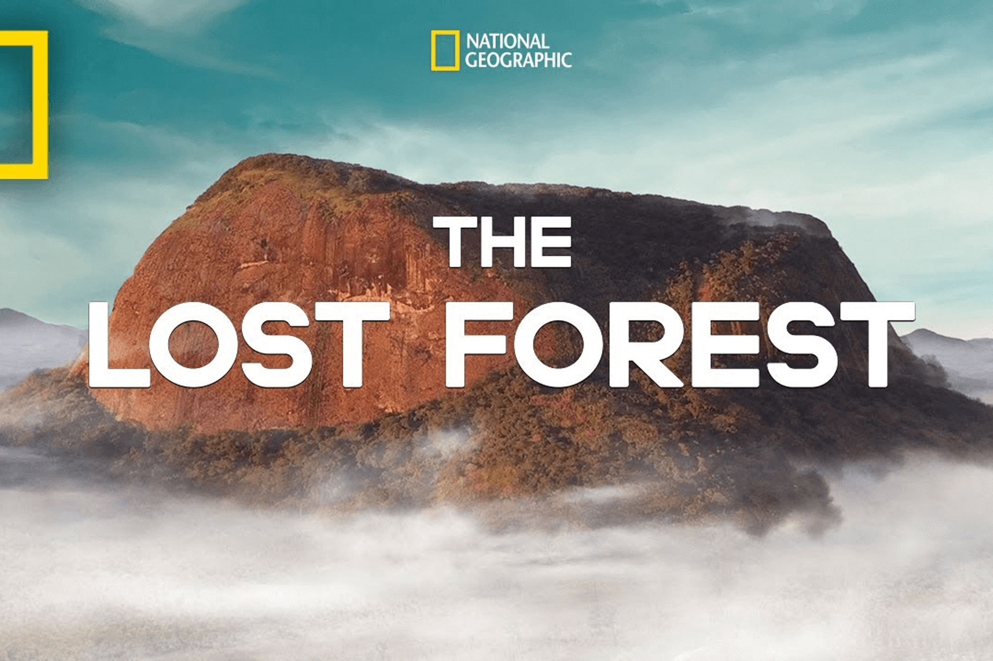 Title card for The Lost Forest, the title overlaid on the image of a cloud-shrouded mount Lico