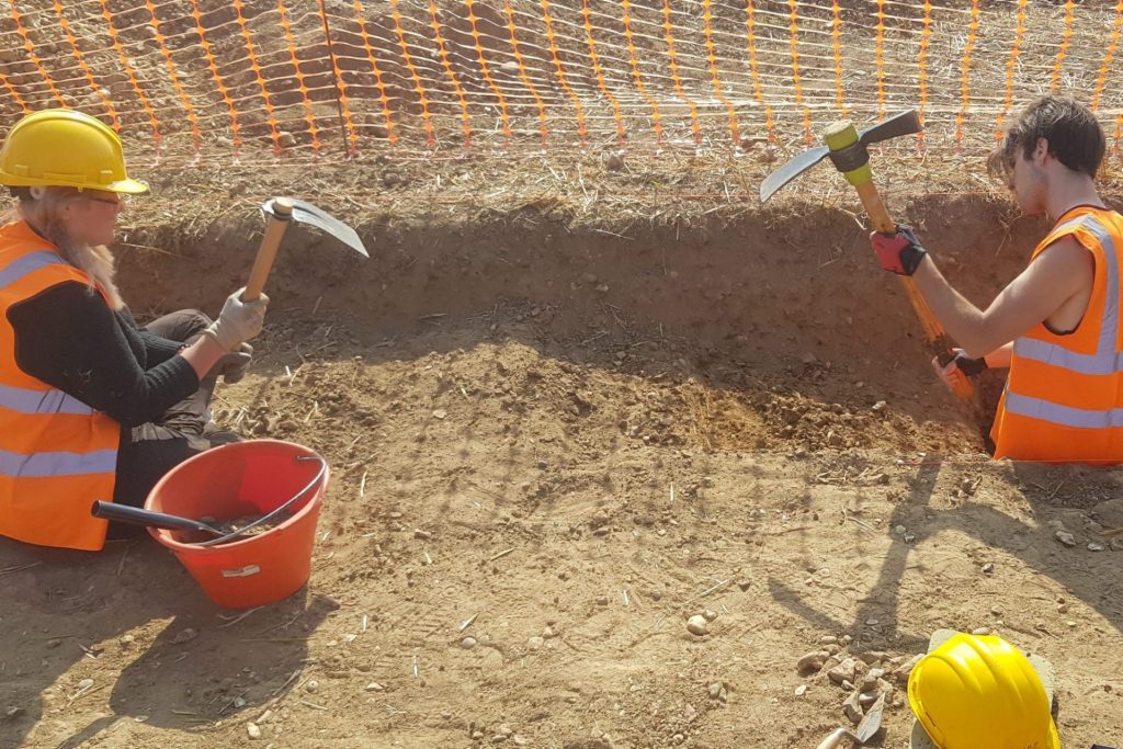 Two Uni Kent students digging at the Blean Church Field excavation site