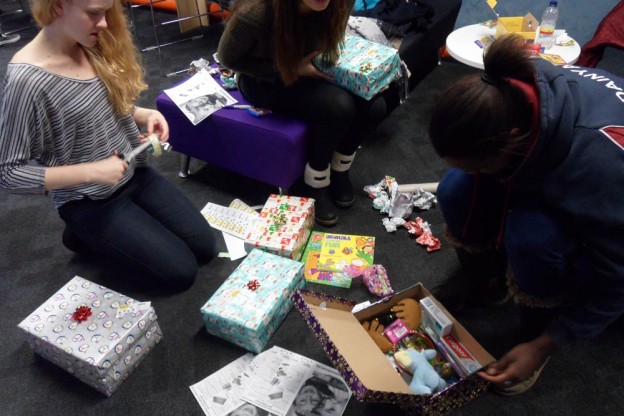Image of students filling boxes
