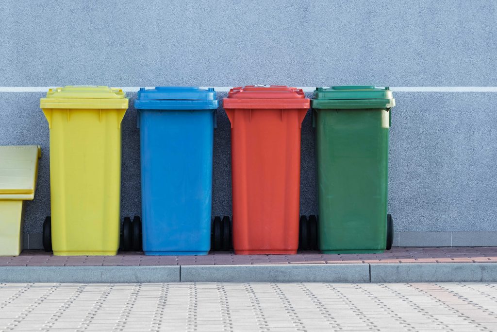 4 different coloured dustbins