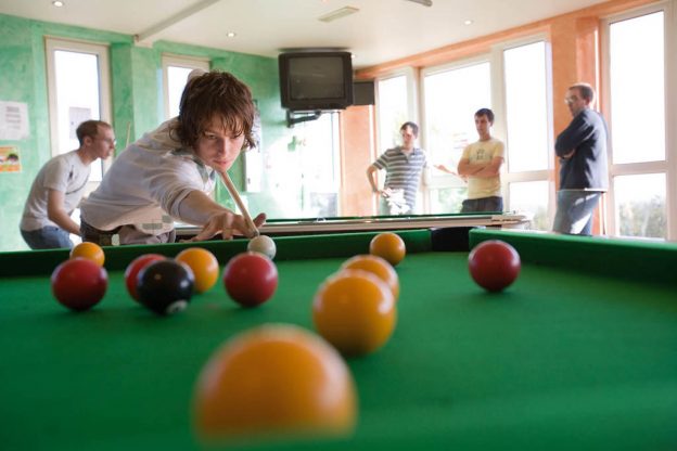 students playing pool