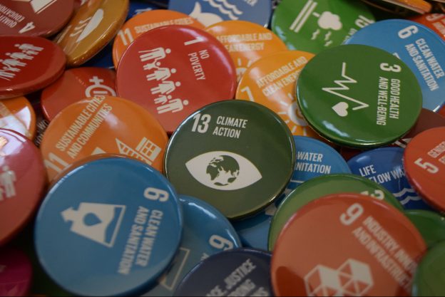 Colour badges with sustainability messaging