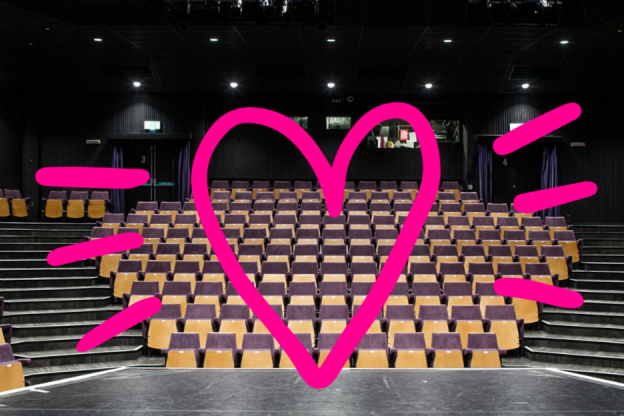 Empty Gulbenkian theatre with a pink heart designed in front of the image