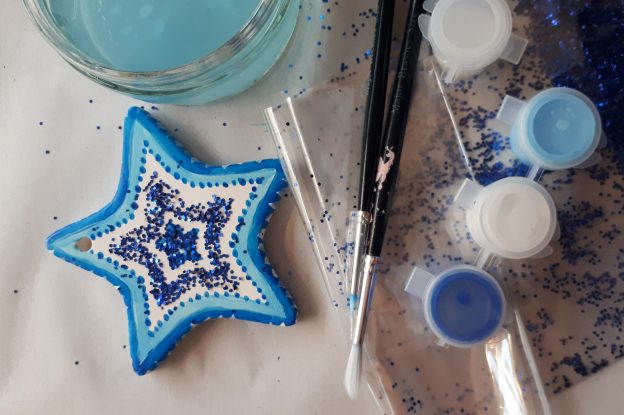 star christmas decoration with paints