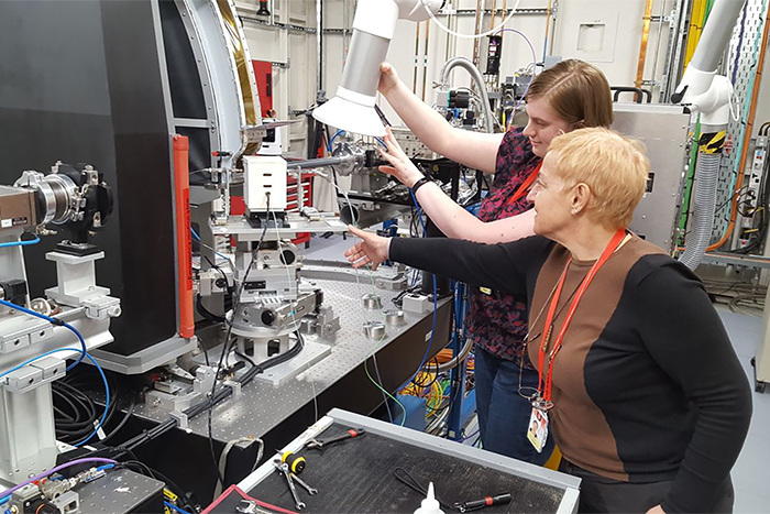 Anna Corrias with former graduate student Lucy Morgan, using an x-ray apparatus to study sol-gel materials