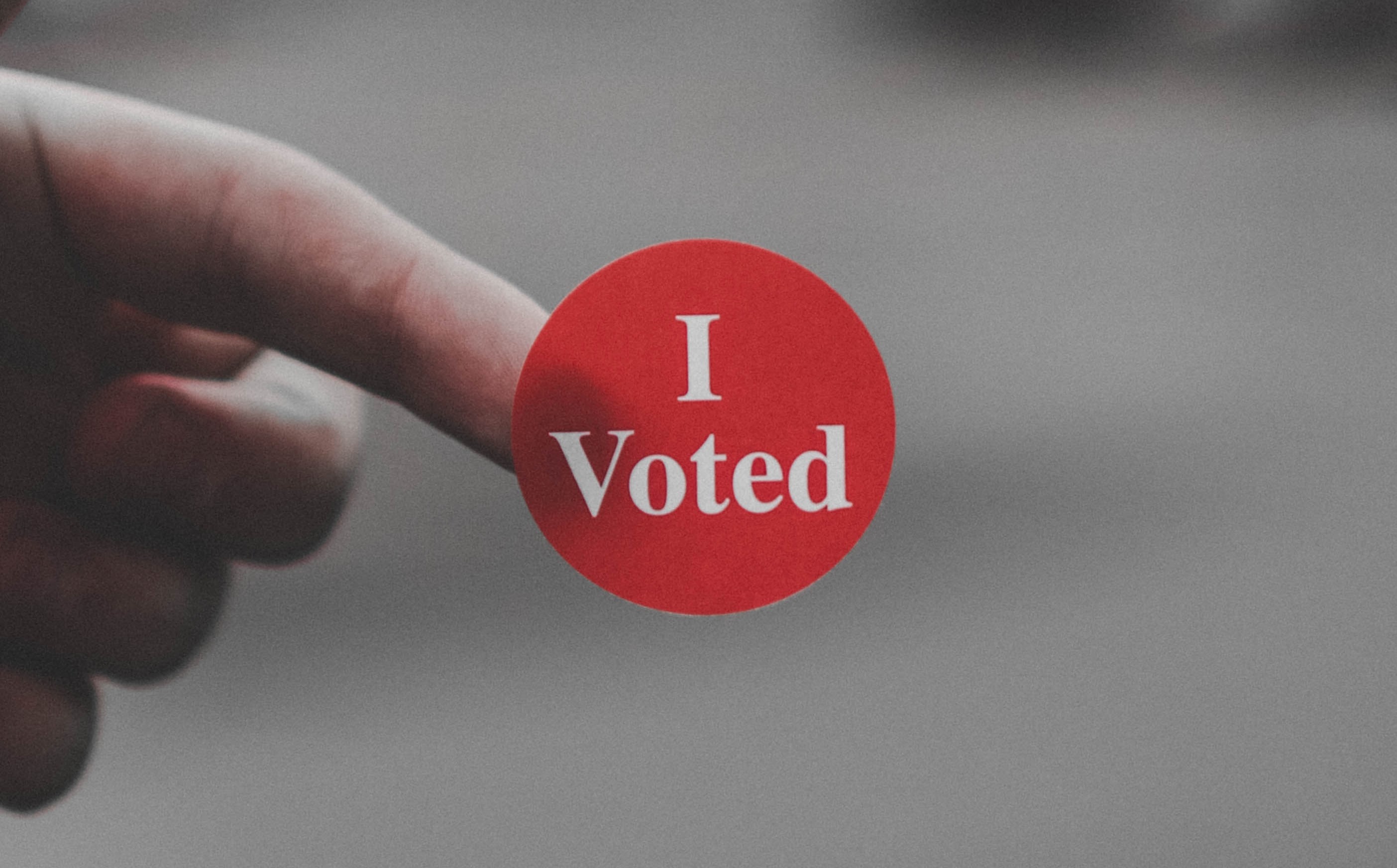 red sticker with the text 'I voted'