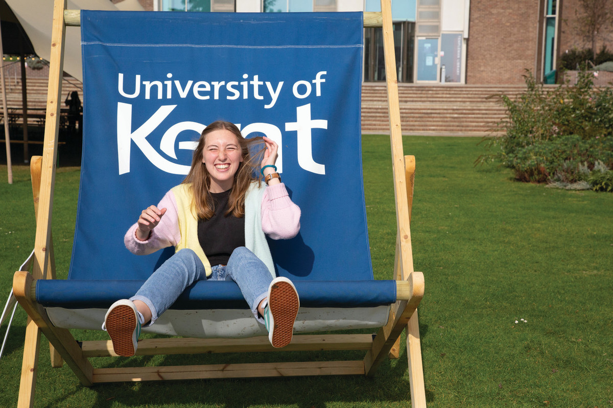 Student on large deck chair