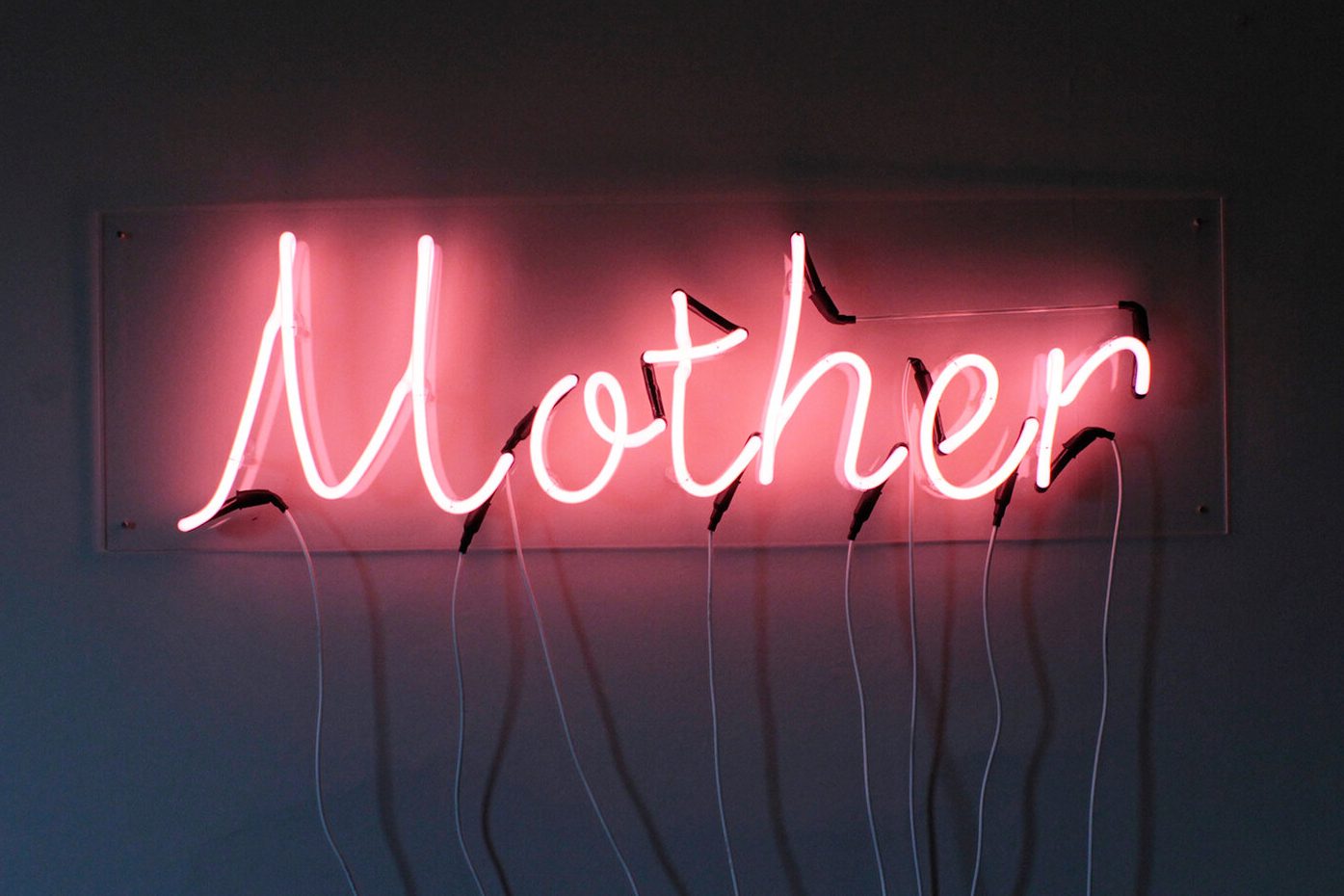 "Mother" in neon lights.