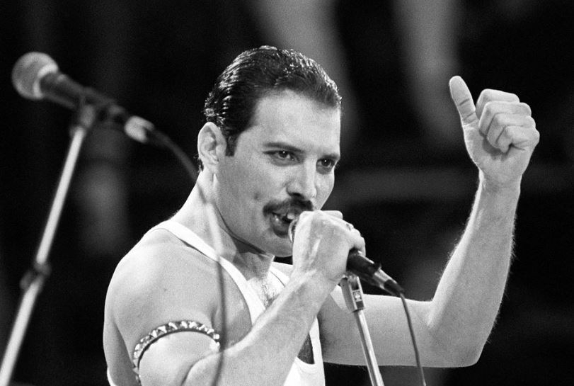 Freddie Mercury, performing on stage during the Live Aid concert