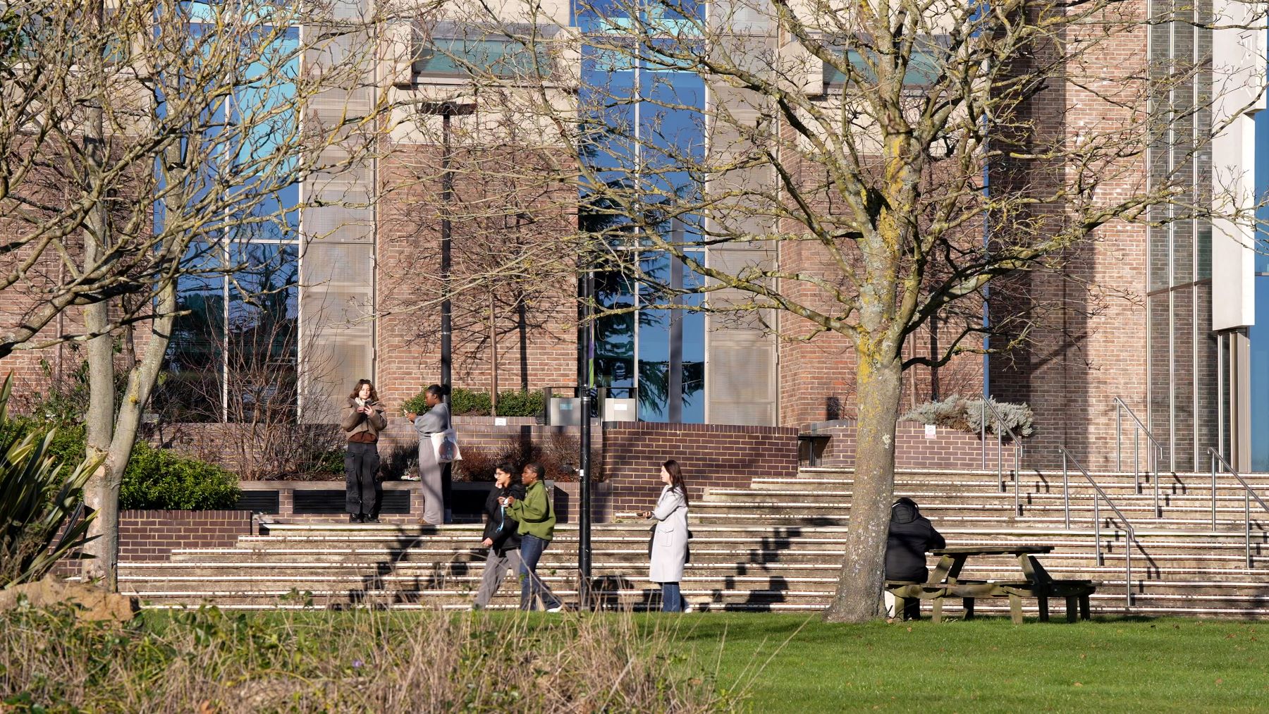 Students walking past Templeman Library