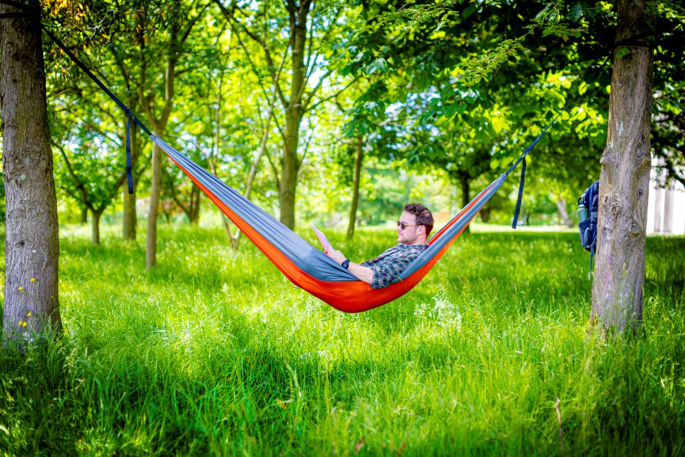 Student chilling in a hammock