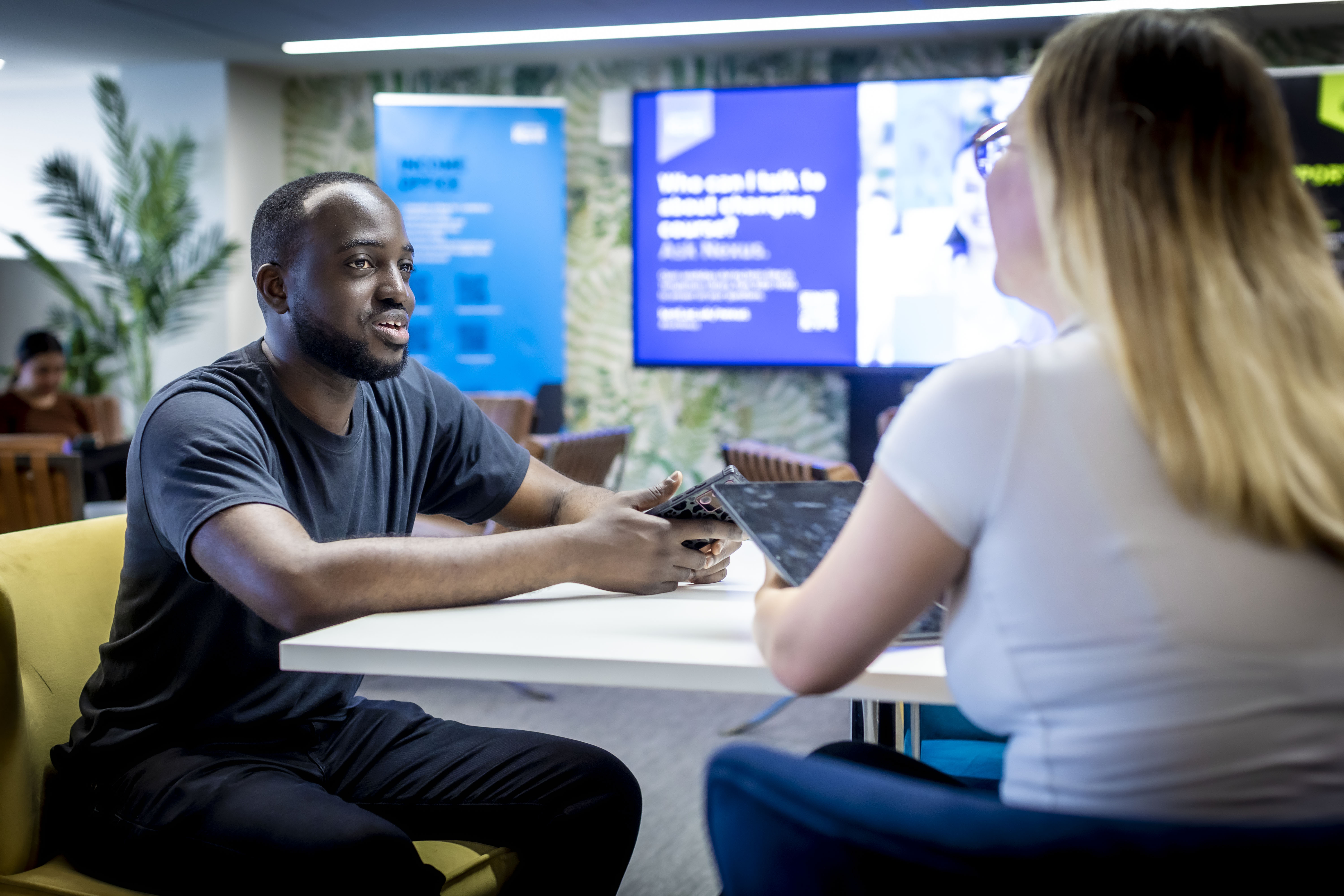 staff and student talking