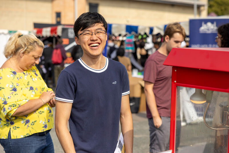 student smiling at camera