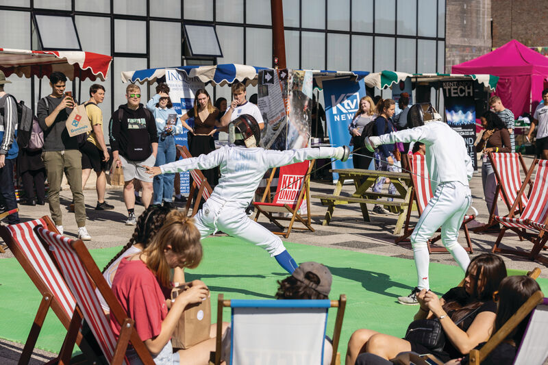 Students fencing at Welcome Fair