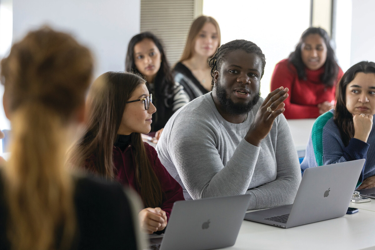 student talking in meeting