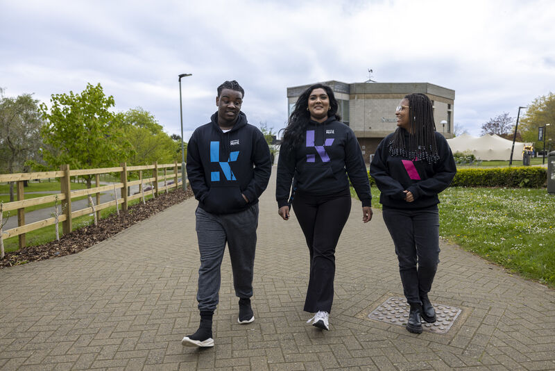 students walking on campus