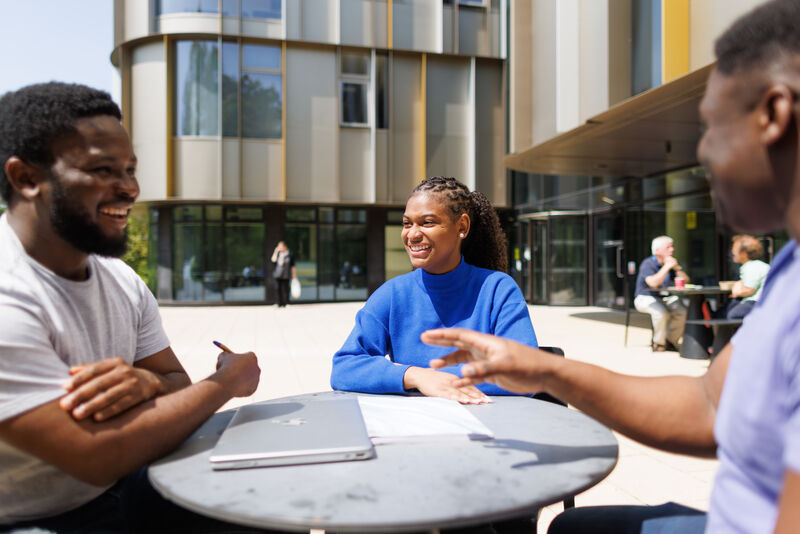 students talking outside sibson