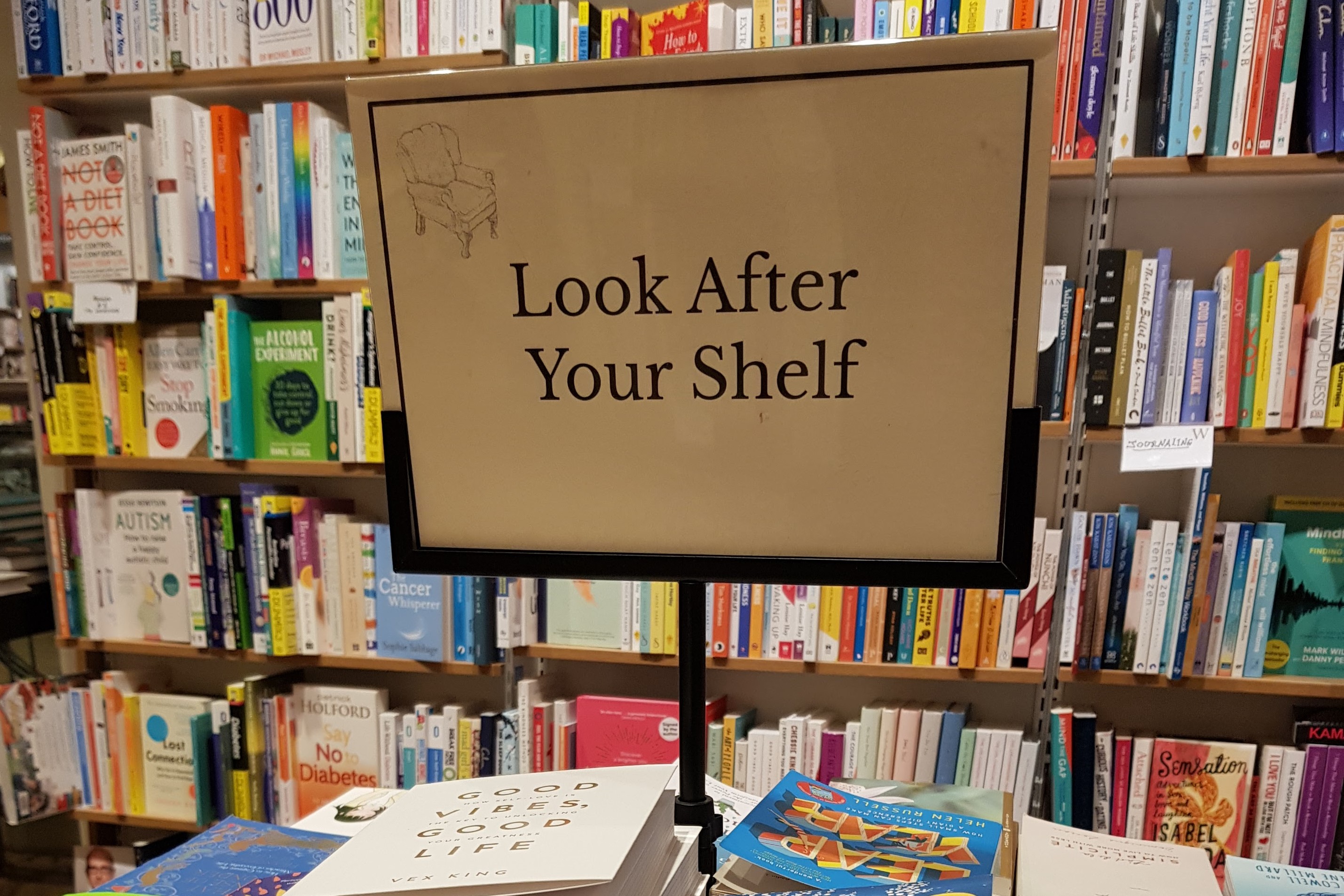 picture of 'look after your shelf' sign in a book shop