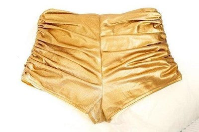 close up of golden running pants