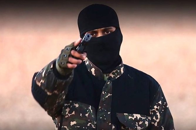 masked jihadist pointing gun