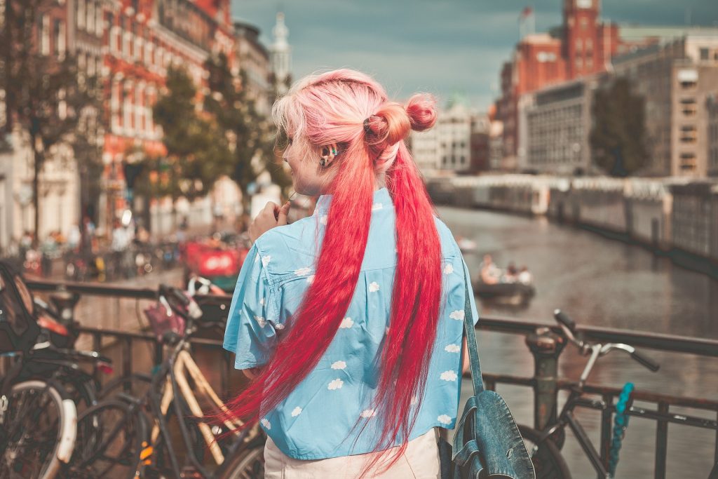 Go abroad image woman with pink hair